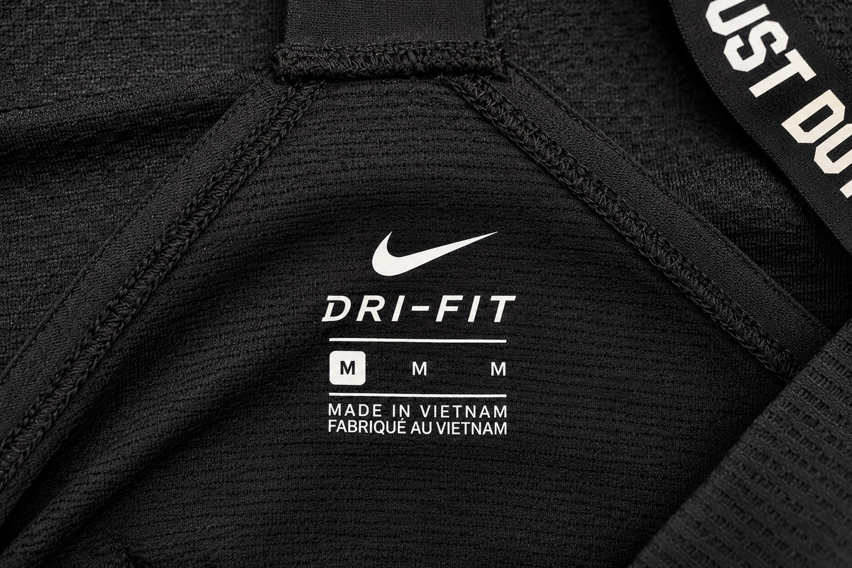 Women's Nike Dri-FIT Black Long-Sleeve Open-Back Top – Size M